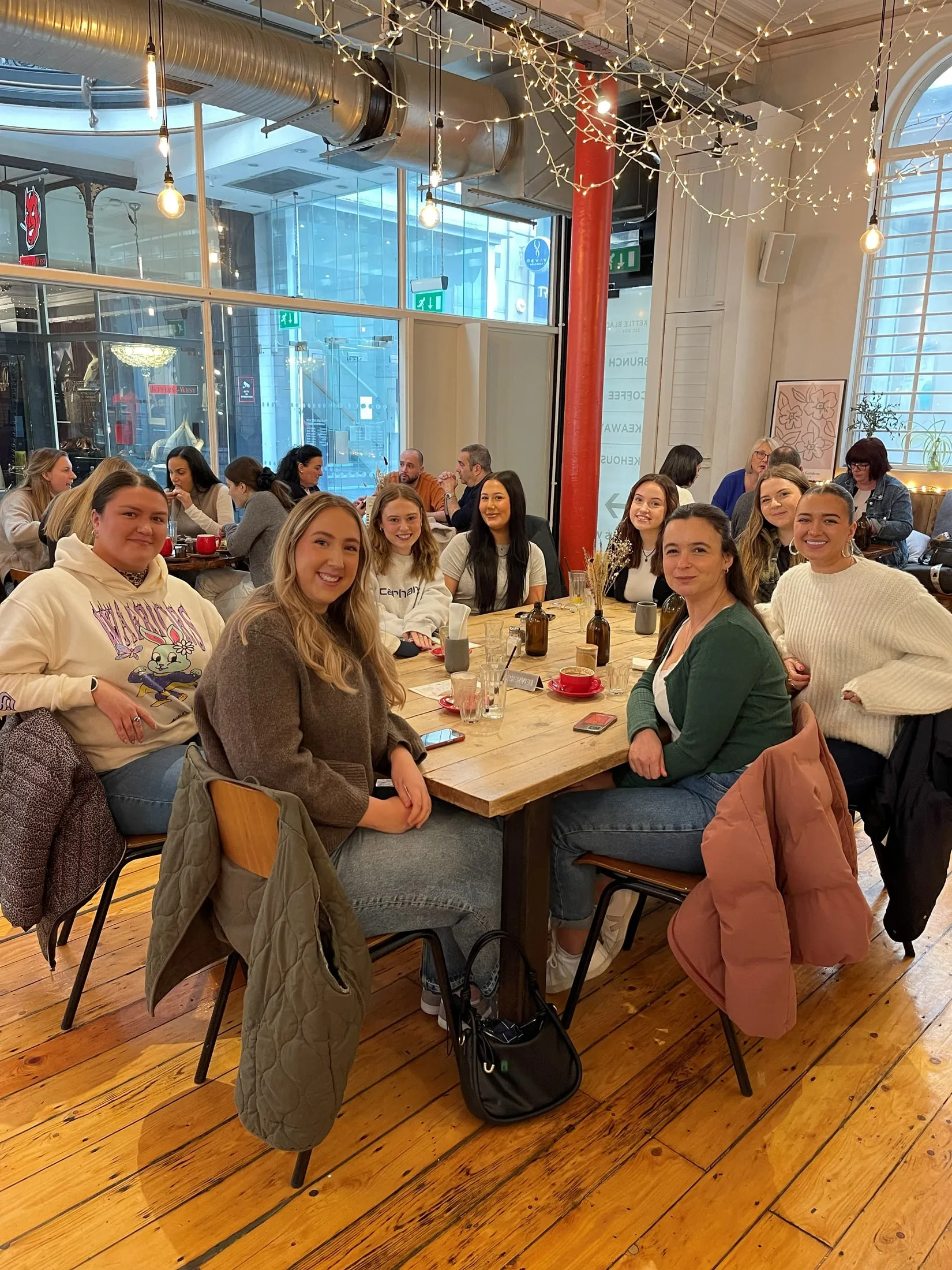 A group of women around a table at brunch